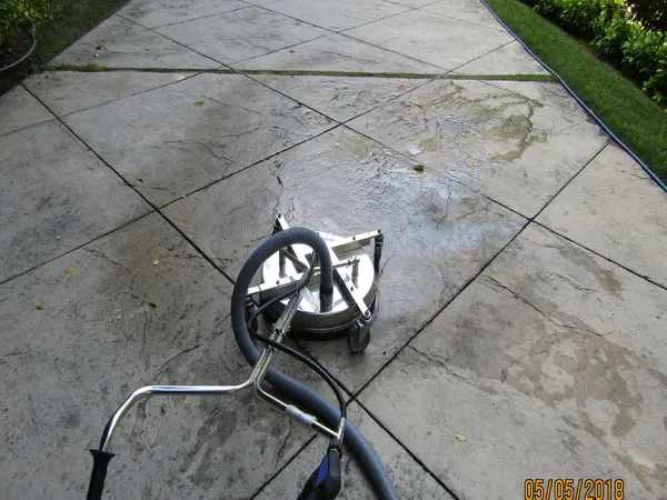 Surface cleaner on a concrete driveway