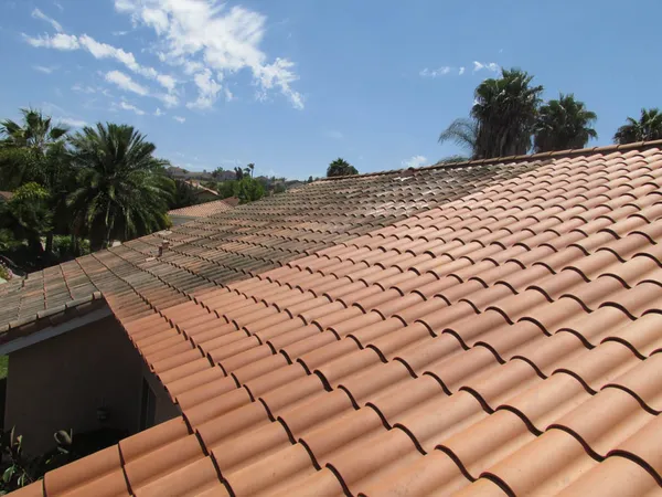 Roof cleaning work on a residential property